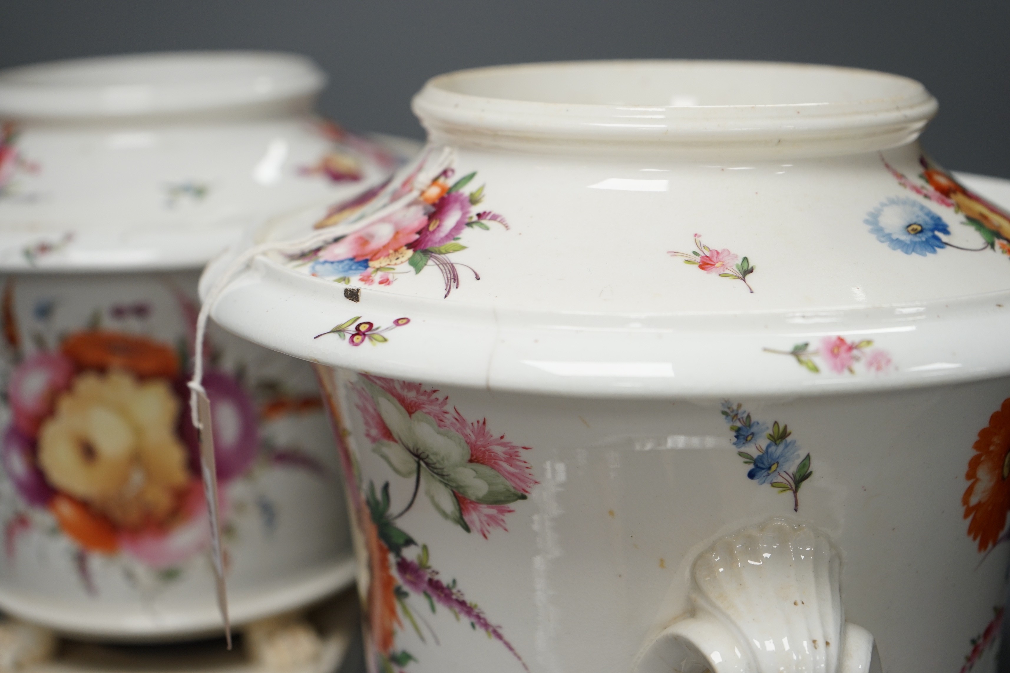 A pair of early 19th century Coalport floral painted ice pails, 29cm